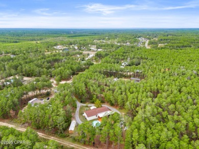 Nestled at the end of a quiet paved cul-de-sac, this spacious