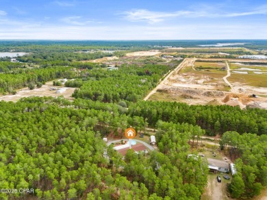 Nestled at the end of a quiet paved cul-de-sac, this spacious