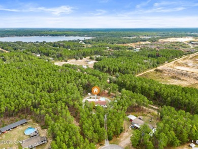 Nestled at the end of a quiet paved cul-de-sac, this spacious