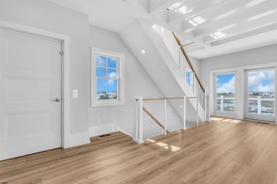 Welcome to your Beach House, a stunning example of contemporary