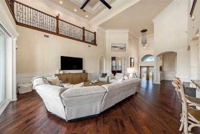 This elegant Spanish Mediterranean residence captures the heart