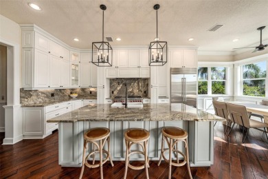 This elegant Spanish Mediterranean residence captures the heart