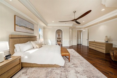 This elegant Spanish Mediterranean residence captures the heart