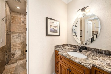 This elegant Spanish Mediterranean residence captures the heart