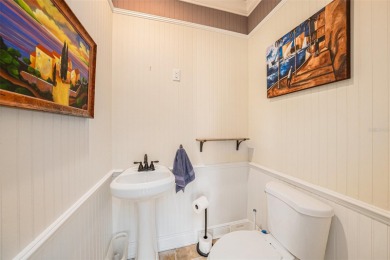 This elegant Spanish Mediterranean residence captures the heart