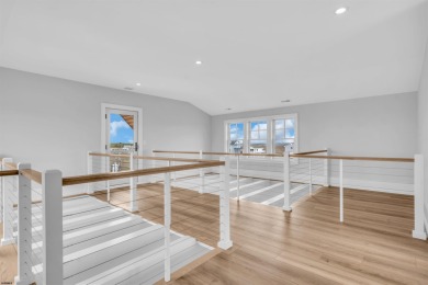 Welcome to your Beach House, a stunning example of contemporary