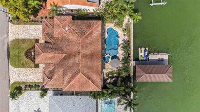 This elegant Spanish Mediterranean residence captures the heart
