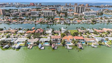 This elegant Spanish Mediterranean residence captures the heart