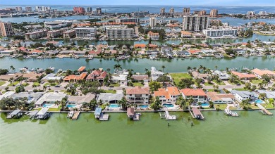 This elegant Spanish Mediterranean residence captures the heart
