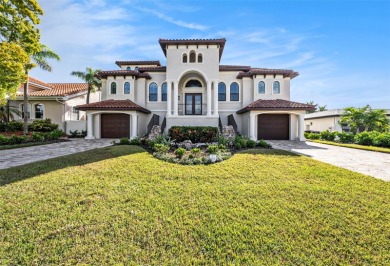 This elegant Spanish Mediterranean residence captures the heart