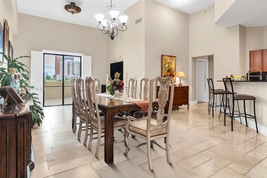 Discover this rare 2-bedroom, 2-bath plus den residence at The