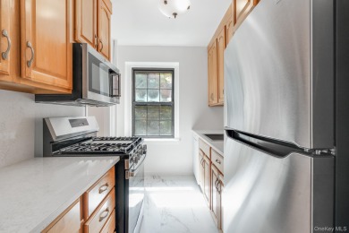 Maintenance free living in the heart of Scarsdale, highly sought