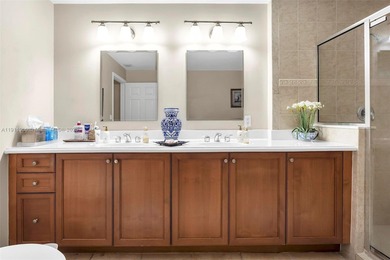 Discover this rare 2-bedroom, 2-bath plus den residence at The