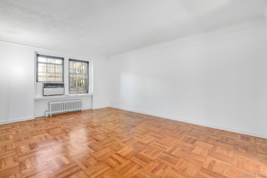 Maintenance free living in the heart of Scarsdale, highly sought