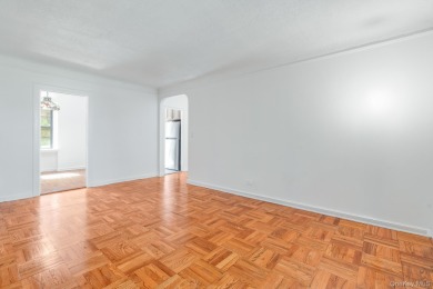 Maintenance free living in the heart of Scarsdale, highly sought