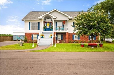 Luxury meets Oxbow with this elegant lakefront home, where