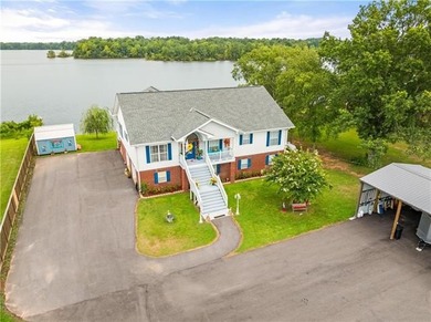 Luxury meets Oxbow with this elegant lakefront home, where