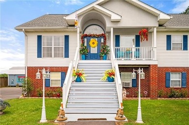 Luxury meets Oxbow with this elegant lakefront home, where