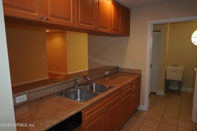 Over $10,000 price improvement! Mediterranean style end-unit