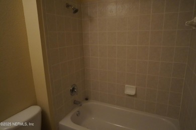 Over $10,000 price improvement! Mediterranean style end-unit