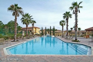 Over $10,000 price improvement! Mediterranean style end-unit