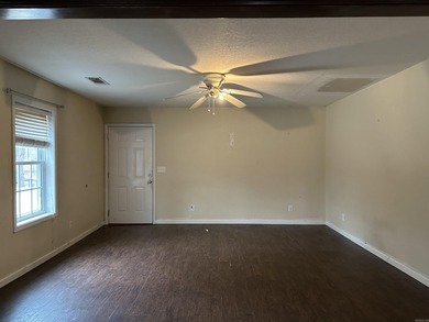 Affordable 3 or 4 bedroom home on Lake Catherine with permitted