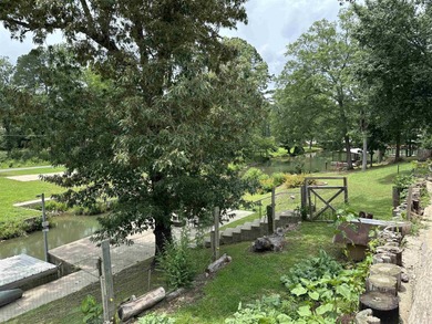 Affordable 3 or 4 bedroom home on Lake Catherine with permitted