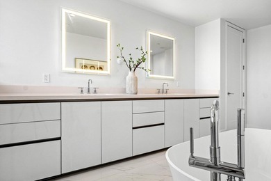 Discover an exceptional residence in the sought-after East Tower