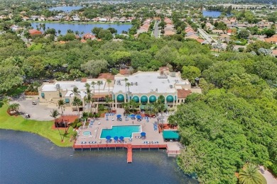 Experience the best of Pine Island Ridge in this spacious rarely