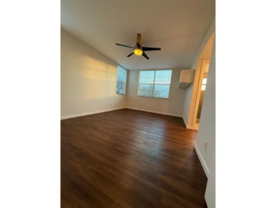 Experience the best of Pine Island Ridge in this spacious rarely