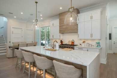 Experience the pinnacle of beachside living in this exquisite