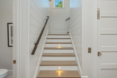 Experience the pinnacle of beachside living in this exquisite