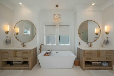 Experience the pinnacle of beachside living in this exquisite