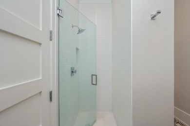 Experience the pinnacle of beachside living in this exquisite