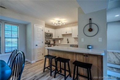 This 3 bedroom, 2 bath condo is sleek, modern & truly move-in