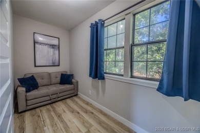 This 3 bedroom, 2 bath condo is sleek, modern & truly move-in