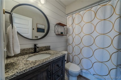 This 3 bedroom, 2 bath condo is sleek, modern & truly move-in