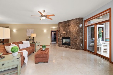 Experience refined waterfront living in this expansive