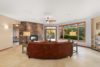 Experience refined waterfront living in this expansive