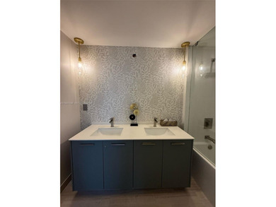 BrickellHouse is a 46-story luxury tower offering studios to