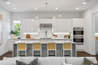 Experience elevated modern living in this 2019-built residence