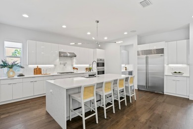 Experience elevated modern living in this 2019-built residence