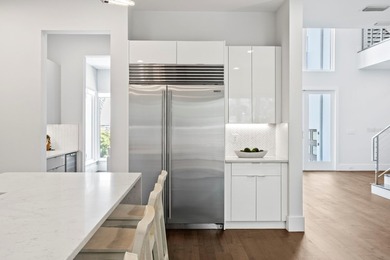 Experience elevated modern living in this 2019-built residence