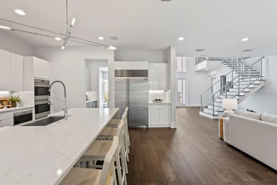 Experience elevated modern living in this 2019-built residence