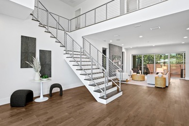 Experience elevated modern living in this 2019-built residence