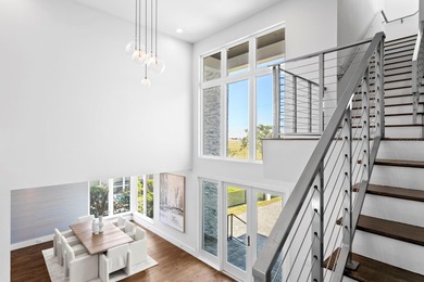 Experience elevated modern living in this 2019-built residence