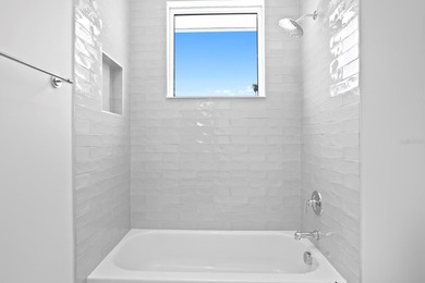 Experience elevated modern living in this 2019-built residence