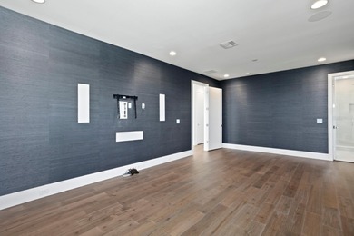 Experience elevated modern living in this 2019-built residence