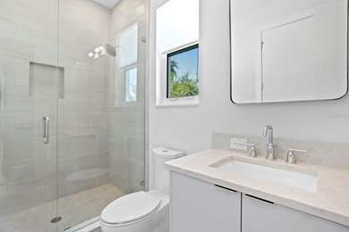 Experience elevated modern living in this 2019-built residence