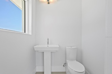 Experience elevated modern living in this 2019-built residence